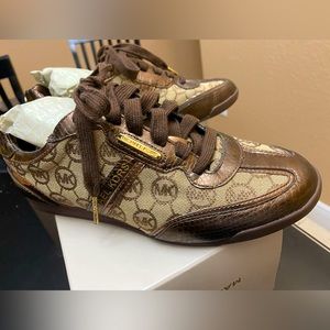Michael Kors sneakers , size 7 totally New. No box